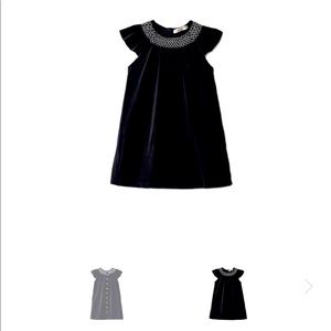 Girl black velvet smocked jumper size 6